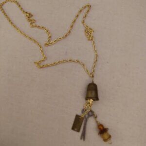 Gold tone dangle sewing charms necklace. (Thimble, scissors, ruler, etc.).